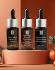 Eminence Organic serums trio with festive pine branches