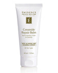 White tube of Eminence Organic Ceramide Repair Balm with gold and black text, designed for dry and damaged skin, SKU: 12345