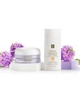Eminence Organics SPF Fluid with Bakuchiol Moisturizer and flowers