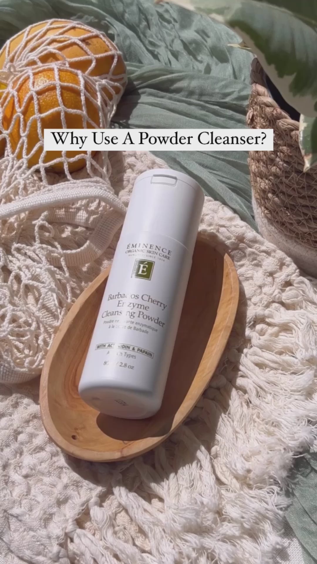 Eminence Cherry Enzyme Cleanser in wooden bowl with text overlay